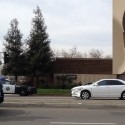 Police Hit By Gunfire – One Suspect In Custody But Another Still At Large