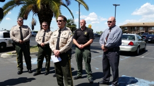 Sheriff Mike Boudreaux speaks to the media Tuesday following an officer involved shooting at a motel in Lindsay. The fugitive captured was one of the Sheriff's Top 10 Most Wanted Criminals in Hiding. The fugitive, Randall Ver Steeg, is in intensive care at Kaweah Delta Medical Center with a two deputies standing guard. He's listed in stable condition.