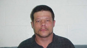 This June 8, 2010 photo provided by the Kay County Detention Center shows Michael Vance. Authorities are searching for Vance, who is suspected in a double slaying and accused of shooting and wounding multiple police officers near Oklahoma City on Sunday, Oct. 23, 2016. (Kay County Detention Center via AP)