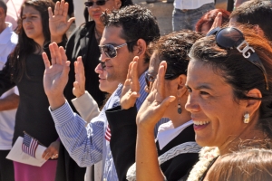 On Thursday, September 23, Grand Canyon National Park in coordination with The Department of Homeland Security, hosted a naturalization ceremony at the Mather Amphitheatre on the South Rim. This is the first time in history that Grand Canyon National Park has hosted such an event.  Under blue skies and before a breathtaking view, 23 individuals from 12 different countries including, Colombia, Dominican Republic, Guatemala, Japan, Mexico, Morocco, Australia, Trinidad and Tobago, Uruguay, Venezuela, Vietnam and Zambia, became naturalized citizens. Many family members and close friends of the candidates came to show their support for this special event. Park employees and visitors also watched on as the candidates stated the Oath of Allegiance, and received their certificates of naturalization.  Deputy Superintendent Palma Wilson welcomed the candidates and their families.  The Presentation of Colors was done by the Air Force ROTC Honor Guard of Northern Arizona University. John M. Ramirez, Acting District Director for the U.S. Citizenship and Immigration Services (USCIS) administered the Oath of Allegiance to America's newest citizens.  A keynote address was given by USCIS Ombudsman January Contreras. Ms. Contreras stated, Everyday, we welcome new and diverse stories and heritages into the great patchwork of our Nation. United by our devotion to the Constitution and to the civic engagement it inspires, Americans remain committed to the fundamental principles established over two hundred years ago. This event is part of USCISs annual celebration of Constitution Day and Citizenship Day. An estimated 9,258 candidates will become citizens at 63 special ceremonies held across the country and around the world from Sept. 13-24. Constitution Day is celebrated on Sept. 17 in remembrance of the signing of the Constitution in 1787. Since 1952, Citizenship Day has been celebrated in conjunction with Constitution Day, although Congress first underscored the signific