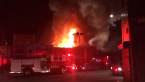 Officials say at least nine people are dead and several are unaccounted for after a fire at a building in Oakland.